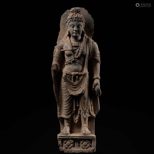 A MONUMENTAL GRAY SCHIST FIGURE OF MAITREYA, KUSHAN PERIOD, ...