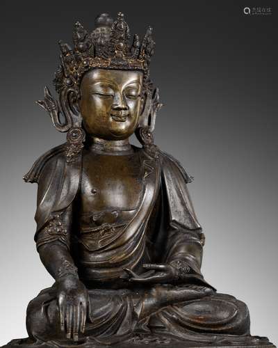 A BRONZE FIGURE OF AKSHOBHYA, CHINA, 15TH CENTURY