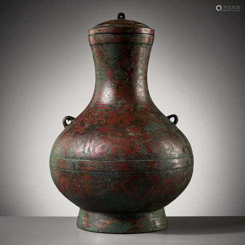 A COPPER-INLAID BRONZE RITUAL WINE VESSEL AND COVER, HU, EAS...