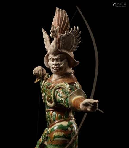 A LARGE SANCAI-GLAZED ‘ARCHER’ GUARDIAN FIGURE (LOKAPALA), T...