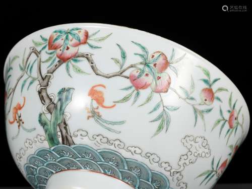 A FAMILLE ROSE 'BATS AND PEACHES’ BOWL, GUANGXU MARK AND PER...
