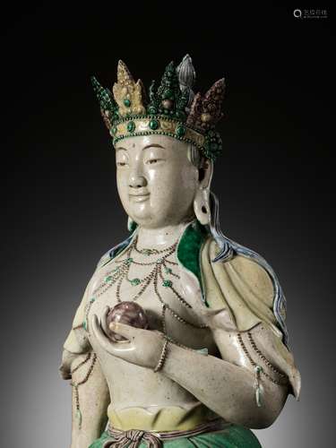 A LARGE FAMILLE VERTE BISCUIT FIGURE OF AMITAYUS, KANGXI PER...