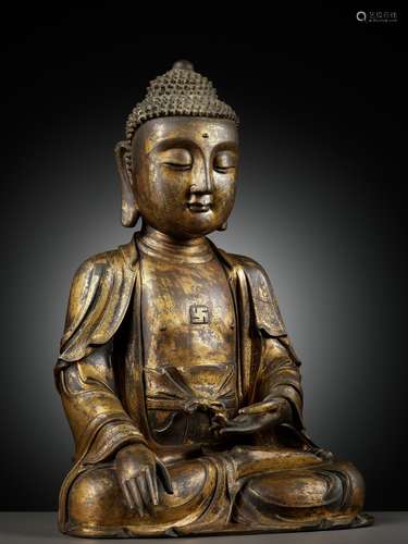 A LARGE GILT BRONZE FIGURE OF BUDDHA, MING DYNASTY