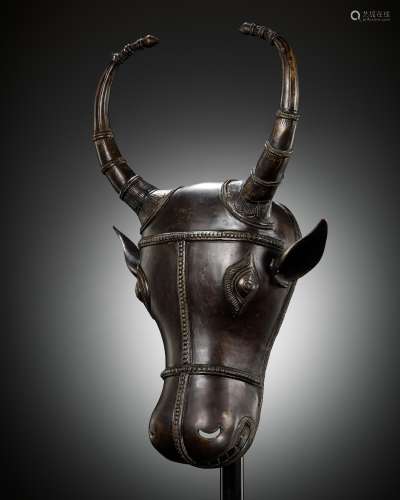 A BRONZE BHUTA CULT MASK OF NANDI, SOUTH INDIA, LATE 18TH TO...