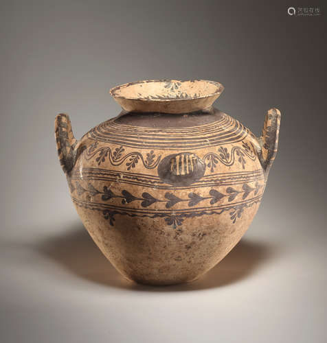 A DAUNIAN POTTERY OLLA WITH HAND PROTOMES AND ARCHED HANDLES...