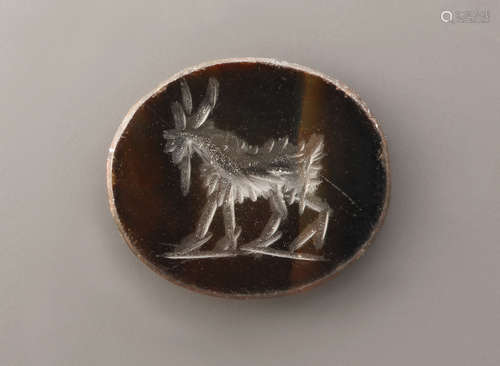 A ROMAN CHALCEDONY INTAGLIO WITH A BILLY GOAT  罗马玉髓凹刻山...