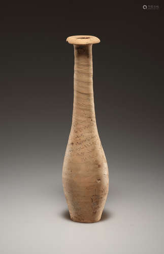 AN EGYPTIAN OR HELLENISTIC LONG NECK BOTTLE WITH INSCRIPTION...