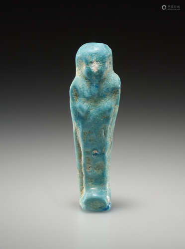 AN EGYPTIAN FAIENCE USHEBTI  一个埃及彩陶乌什布提