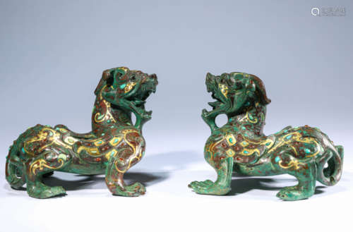 A Set of Bronze Gold and Silver Inlaid Auspicious Beasts