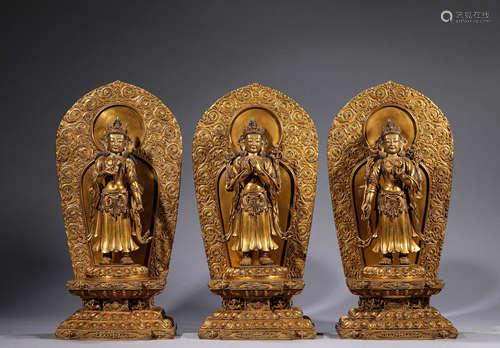 An Imperial Gilt-Bronze Avalakieshvara Statues