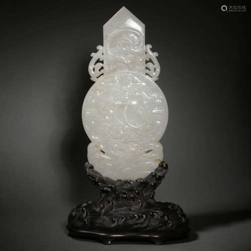 A CARVED WHITE JADE GROUP