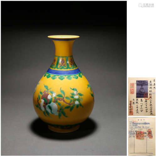 A YELLOW-GROUND FAMILLE ROSE SANDUO PEAR-SHAPED VASE