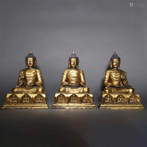 A GROUP OF GILT-BRONZE FIGURES OF BUDDHA