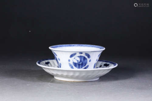 A Blue And White Phoenix Medallion Tea Bowl And Stand