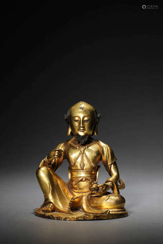 A Gilt-Bronze Statue