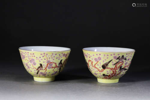 A Pair Of Yellow-Ground Famille Rose Flower And Bird Bowls