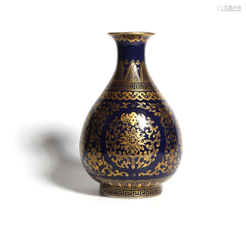 A GILT-DECORATED POWDER-BLUE-GLAZED PEAR-SHAPED VASE