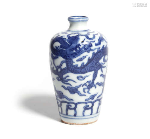 A SMALL BLUE AND WHITE DRAGON VASE