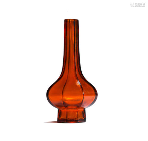 A RED GLASS VASE