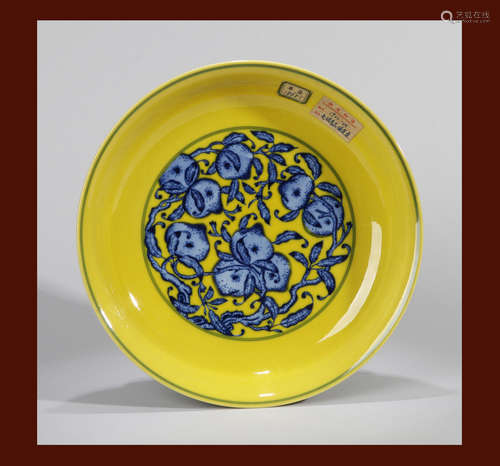 A YELLOW GROUND BLUE AND WHITE FLOWER AND FRUIT PLATE