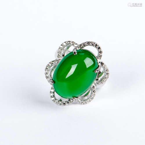 A JADEITE AND DIAMOND RING