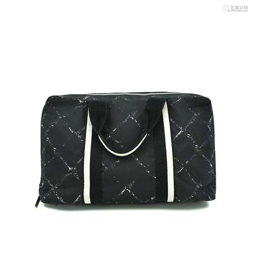 A CHANEL VINTAGE BLACK AND WHITE CANVAS BREIFCASE