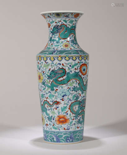 A DOUCAI GLAZED DRAGON WITH FLOWER VASE