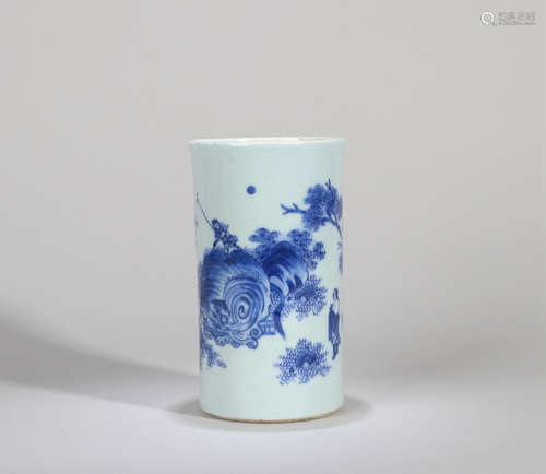 A BLUE AND WHITE FIGURE AND STORY BRUSH POT