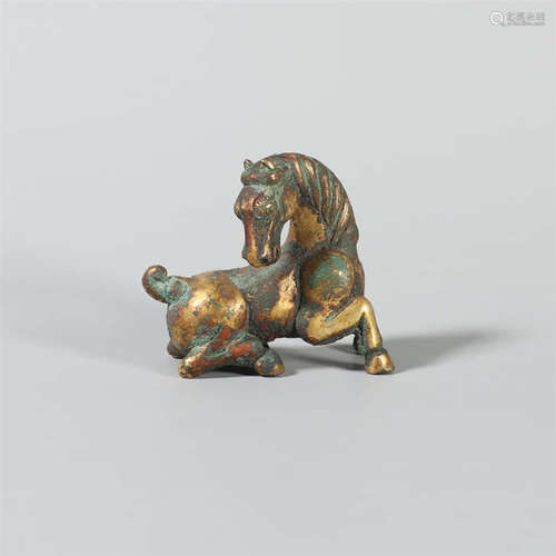 A Gilt Bronze Recumbent Horse Ornament