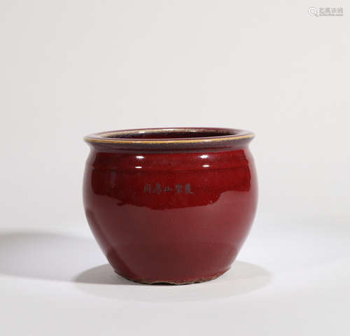 AN ALTAR RED GLAZED JAR