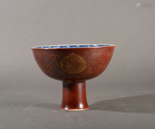 A RED GROUND GILT INTERLOCKING CHRYSANTHEMUMS STEM BOWL