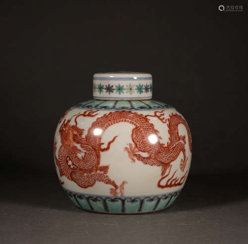 A DOUCAI GLAZED IRON RED DRAGON AND PHOENIX PATTER JAR WITH ...