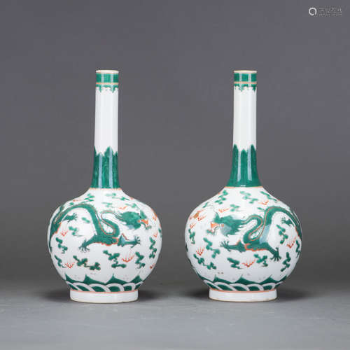 A PAIR OF GREEN ENAMELED 'DRAGON' BOTTLE VASES, QIANLONG MAR...