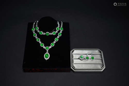 A SET OF JADE NECKLACE, RING, BRACELET AND EARRING