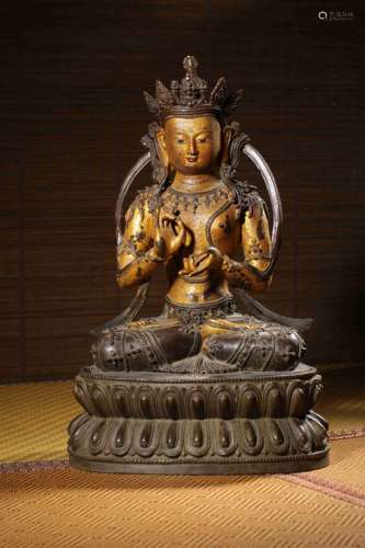A GILT-BRONZE FIGURE OF VAIRDCANA,MARK AND PERIOD OF YONGLE