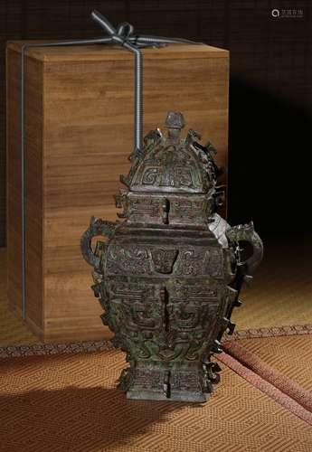 A BRONZE RITUAL WINE VESSEL AND COVER,8TH-6TH CT.BC