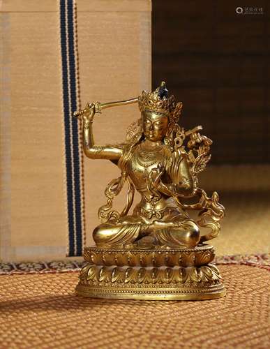 A GILT-BRONZE FIGURE OF MANJUSHRI,QING DYNASTY