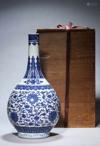 A Blue And White Wrapped Lotus Bottle Vase