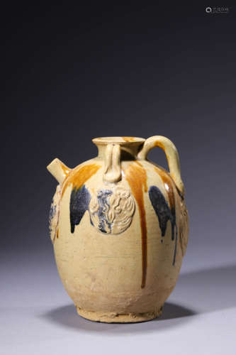 A Carved Sancai Ewer