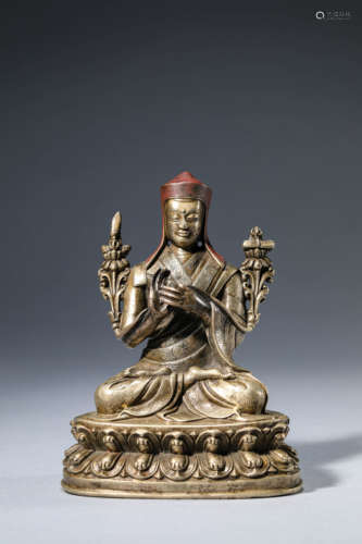 A Silver Figure Of Guru