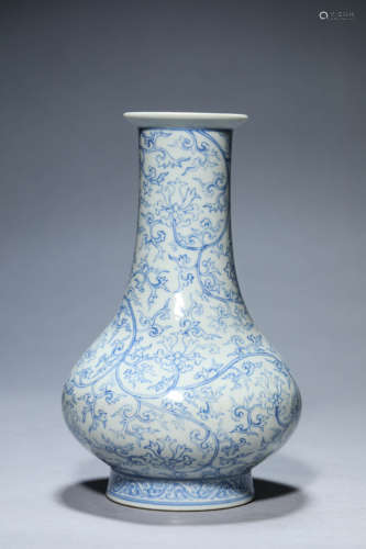 A Blue And White Wrapped Flowers Bottle Vase