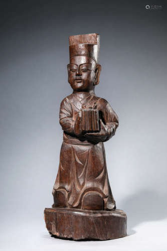 A Carved Wood Figure