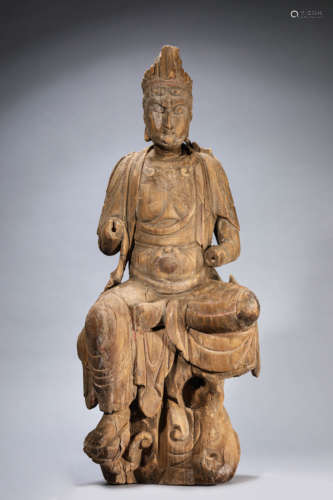 A Carved Wood Figure Of Guanyin