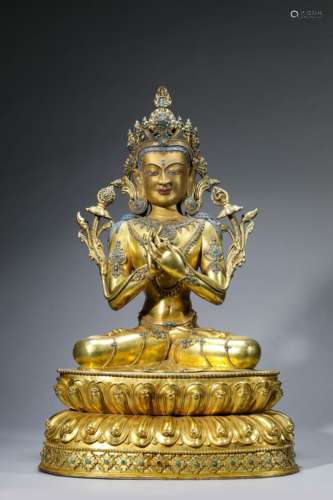 A Gilt-Bronze Figure Of Buddha