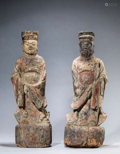 A Group Of Carved Wood Figures