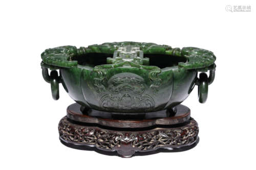 A Carved Celadon Jade Washer