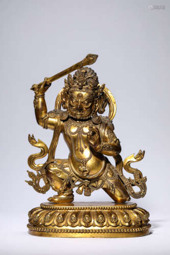 A Gilt-Bronze Figure Of Aksobhya