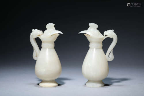 A Pair Of Carved Jade Vases