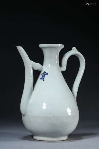 An Incised White-Glazed Flower And Bird Ewer