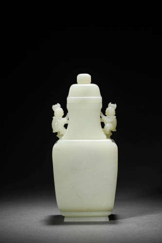 A Hetian Jade Handled Vase And Cover